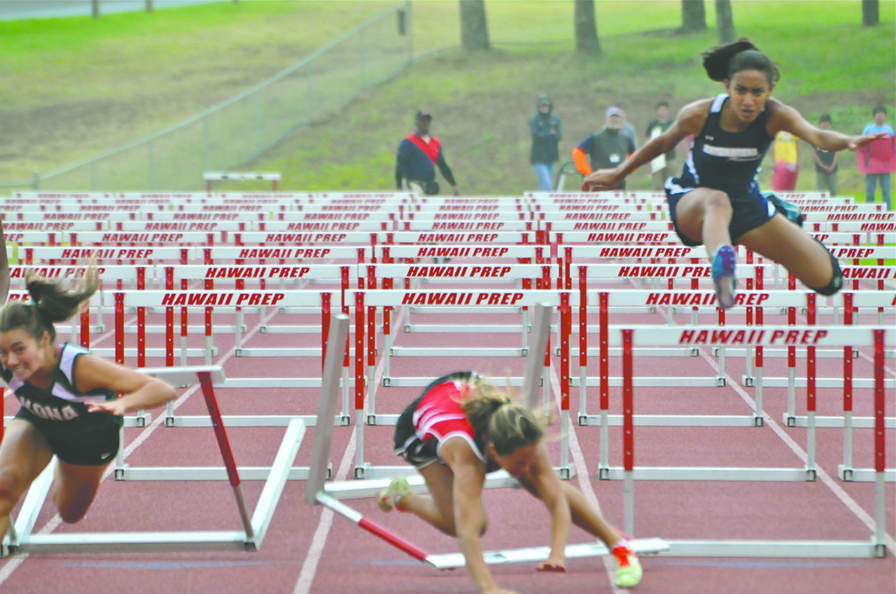 JARED FUJISAKI photo ... Both hurdlers went down as Kamehameha's Casey Poe clears her final hurdle. ...