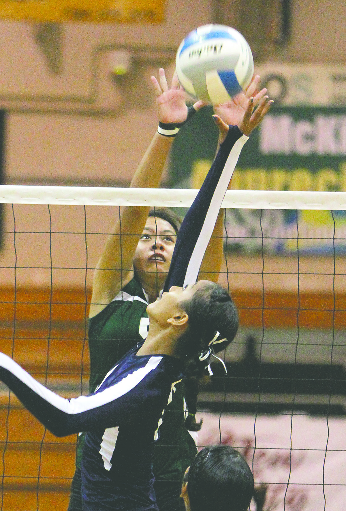 JAY METZGER/Stephens Media Hawaii Konawaena's McKenna Ventura blocks at the net Thursday during its 25-20, 25-14, 25-20 victory against Waimea on Thursday in the semifinals of the HHSAA Division II volleyball tournament.