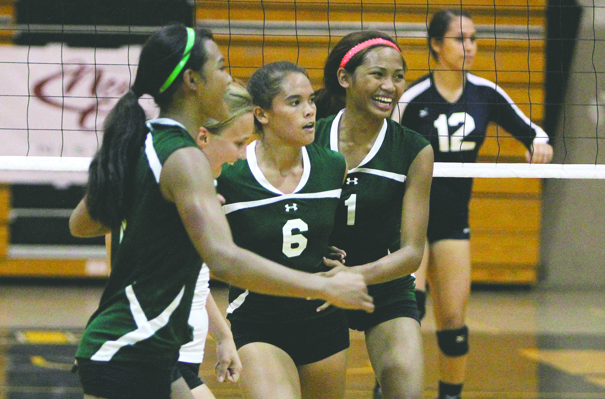 JAY METZGER/Stephens Media Hawaii Konawaena celebrates its 25-20, 25-14, 25-20 victory against Waimea on Thursday in the semifinals of the HHSAA Division II volleyball tournament.