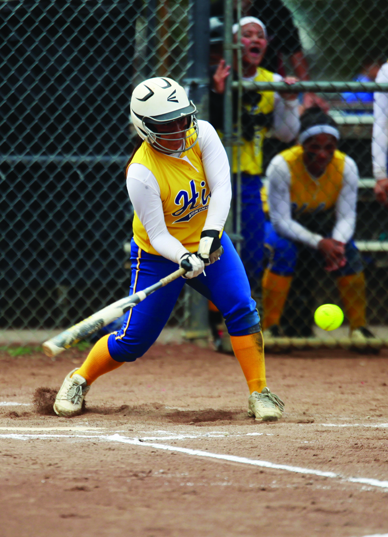 HOLLYN JOHNSON/Tribune-Herald  Hilo’s Reisha Hoopii-Haslam swings Saturday against Keaau.