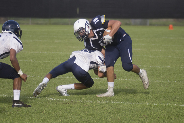 2047465_web1_Waiakea_vs_Waimea_Kauai_Football_6.jpg