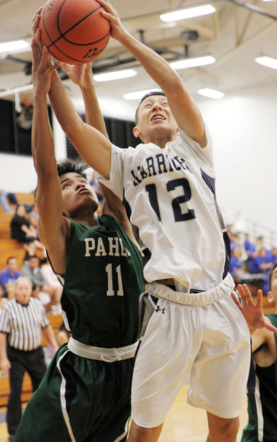 2785371_web1_pahoa-vs-waiakea-02-b-ballPahoa-W.jpg