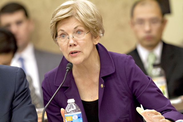 3174902_web1_Elizabeth-Warren-Trum_Chri.jpg