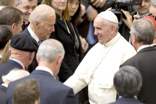 3406218_web1_Vatican-Pope-Biden_Chri.jpg