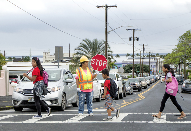 4928408_web1_Crossing_Guards_at_Haili_1.jpg