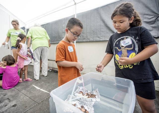 5659963_web1_Imiloa_Summer_Science_Camp_Boats.jpg