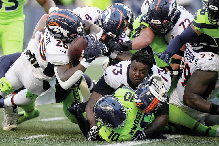 Seahawks survive Wilson's return, edge Broncos on missed FG - West Hawaii  Today