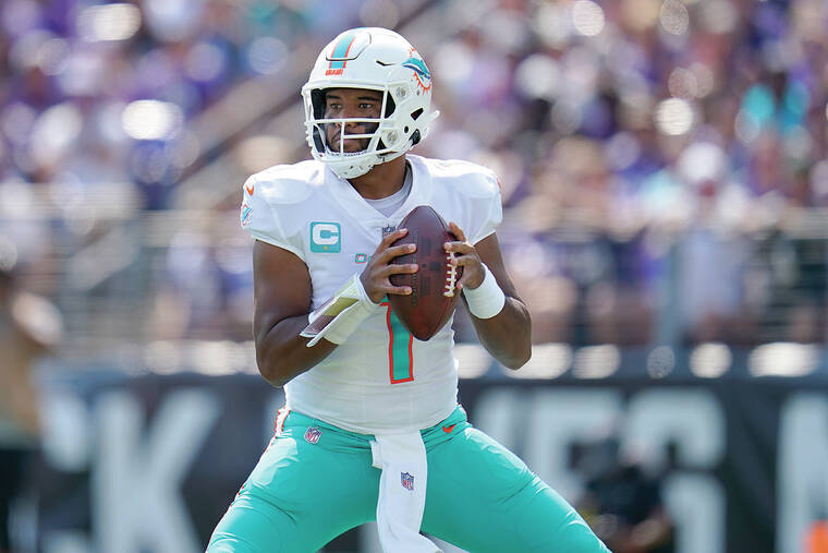 Tua Tagovailoa throws 3 TD passes to rally the Dolphins past the Panthers  42-21 