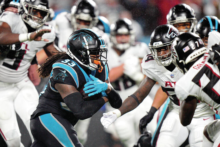 Foreman leads Panthers past rival Falcons in rain, 25-15 - Hawaii