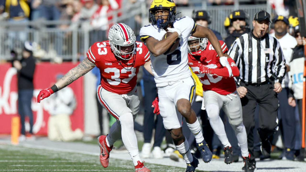 Michigan beats Ohio State 42-27, ends 8-game skid in rivalry