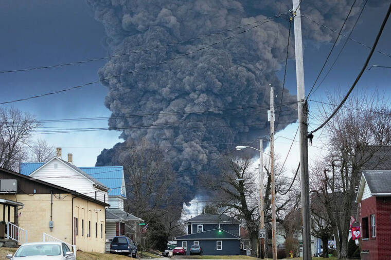 Release of toxic chemicals from derailed tanker cars begins