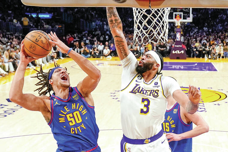 Nuggets champion Aaron Gordon walks through Denver streets