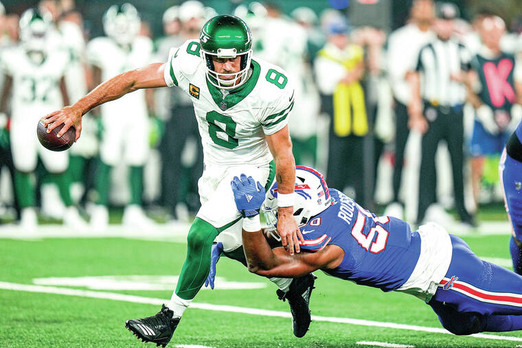 Jets lose Aaron Rodgers to an Achilles tendon injury, then rally to