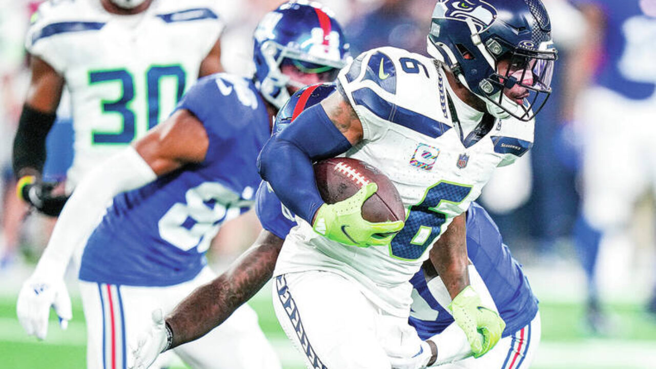 Rookie Devon Witherspoon scores on 97-yard pick-6 as Seahawks' defense  leads Seattle over Giants